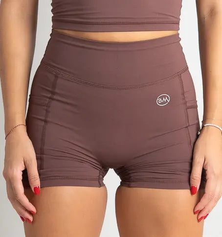 Model wearing Flow Pocket Shorts in Mocha - Barmelle