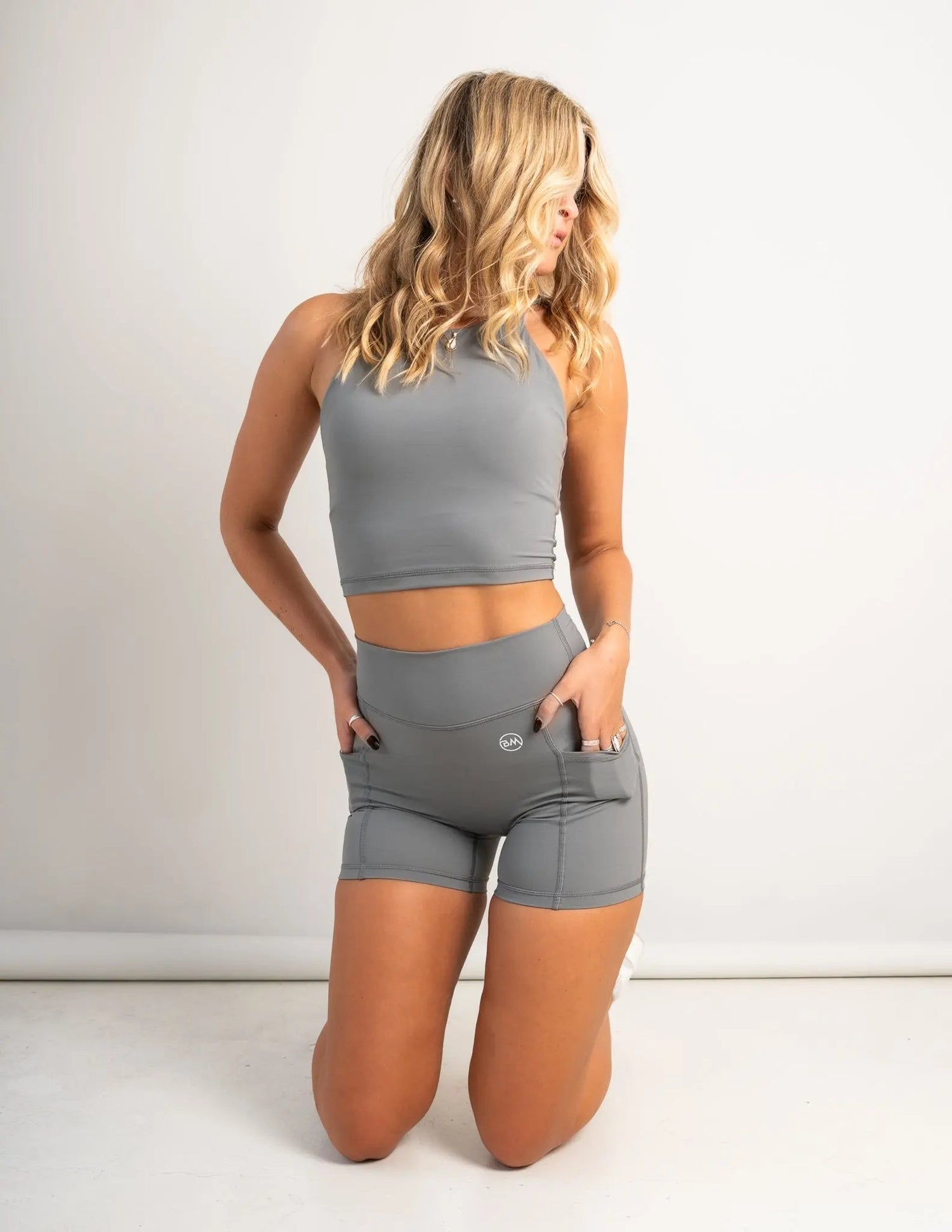 Model wearing Flow Crop Top and Flow Pocket Shorts in Slate - Barmelle